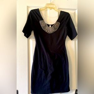 Ladies, black dress brand new with beaded neckline. Size medium